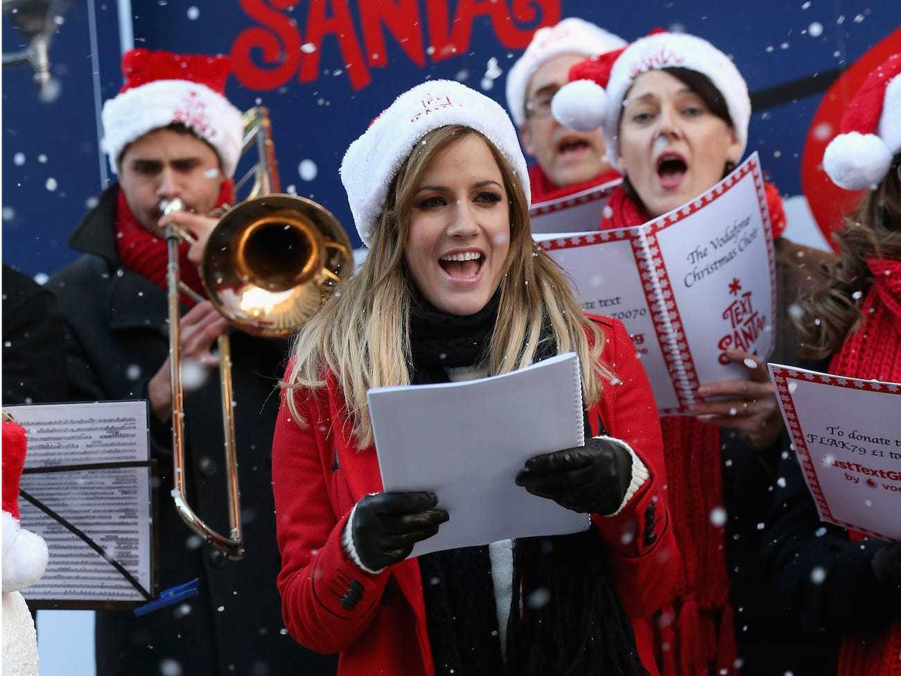 Kate middleton in sequin cardi for together at christmas promo